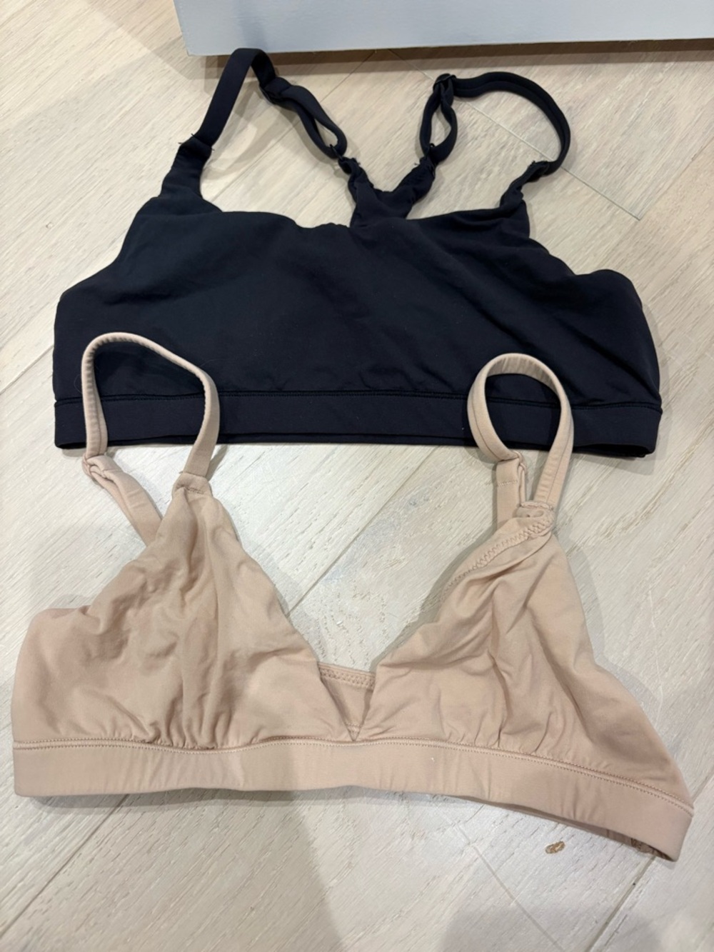 Two women’s Skims bralettes bras black and nude size small